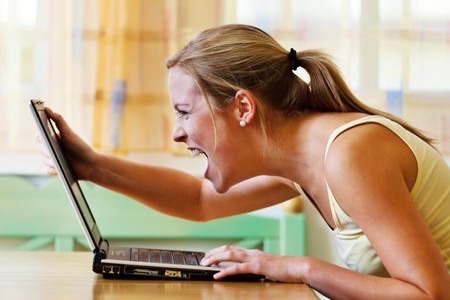 Woman Screaming Over Computer